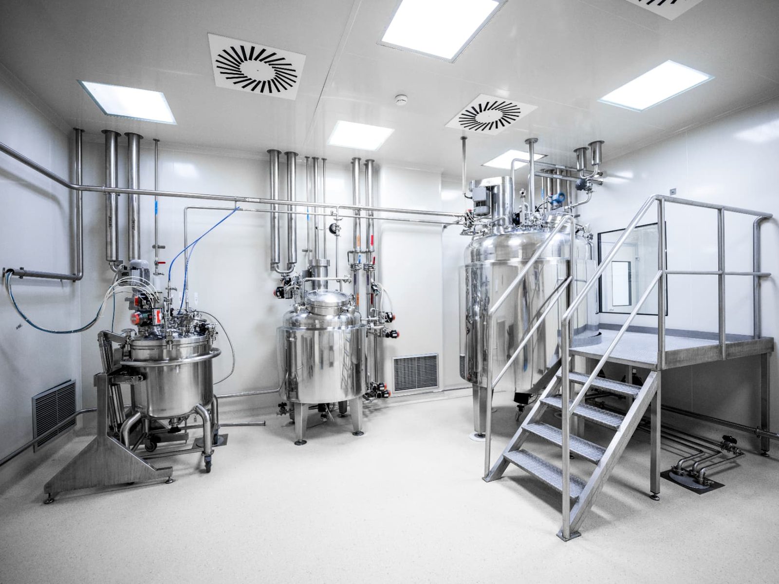 Stainless steel process vessels and piping in a pharmaceutical cleanroom